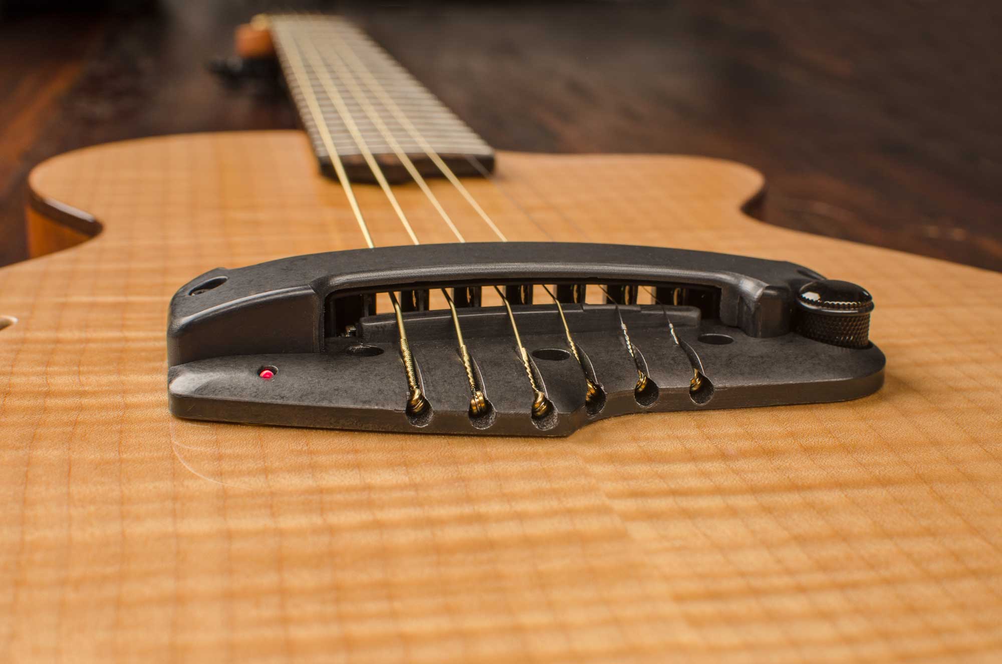 Close up on a LightWave Systems optical pickup, from the Wilcox Guitars website