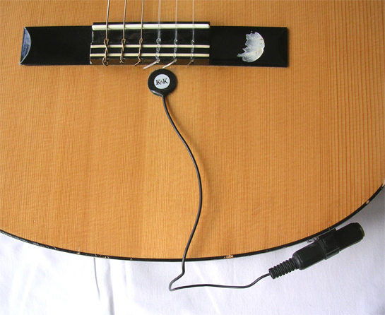 A typical piezo pickup installed on a classical guitar, from Wikipedia