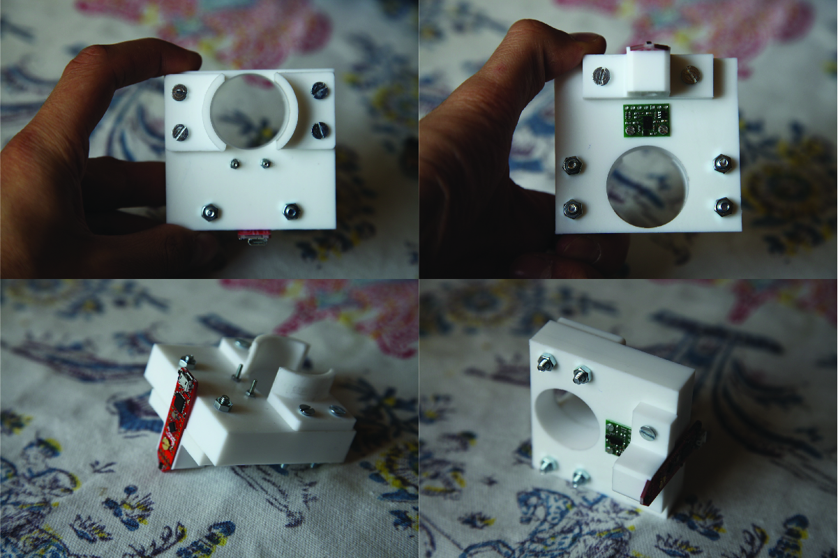 The machined Delrin parts (without the new brass screws)
