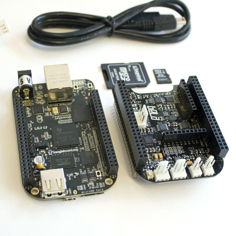 The Bela system : the BeagleBone Black microcontroller (left) and the Bela cape (right)